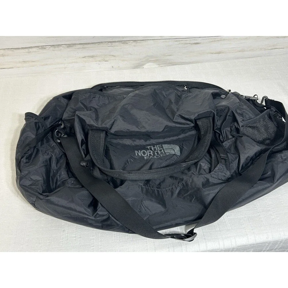 The North Face Large Black Flyweight Light Weight Duffel Bag Camping Hiking Camp